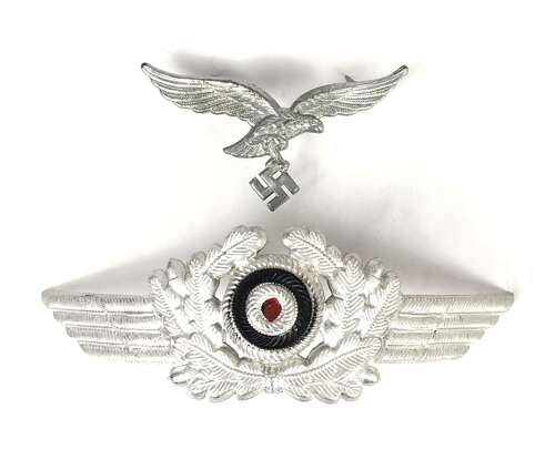WW2 Luftwaffe Eagle & Swastika with winged wreath Cap Badge